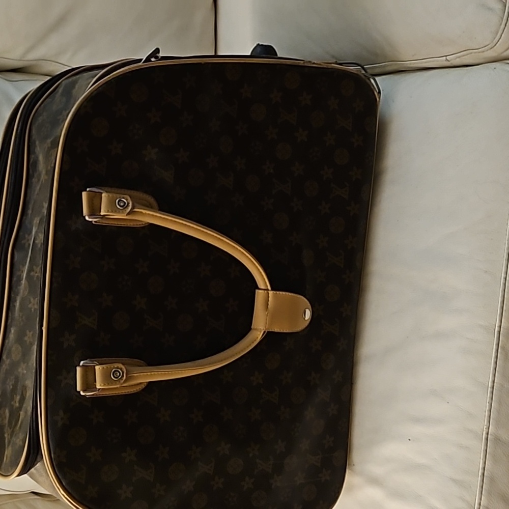 Louis Vuitton travel roller bag